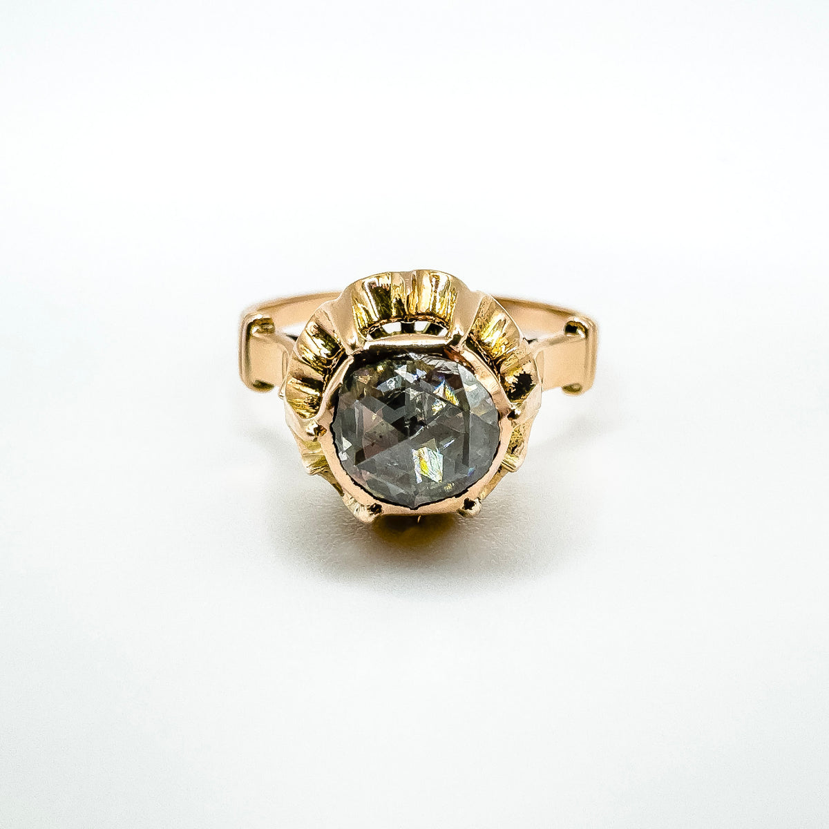 Antique rose gold ring with a single rose cut diamond