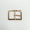 Rear view of 9ct gold buckle charm showing curved pin and clean finish