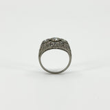 Side view of Art Deco platinum diamond ring showing pierced filigree gallery
