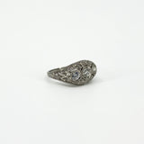 Side profile of Art Deco platinum ring showing filigree openwork and diamond setting