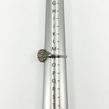 Side view of Art Deco platinum diamond ring on a metal ring sizing mandrel