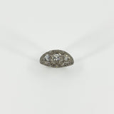Front view of platinum diamond trilogy ring with three main diamonds and milgrain detail