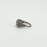 Close side view of Art Deco platinum trilogy ring with old-cut diamonds