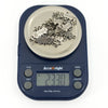 Art Deco sterling silver St Johns Ambulance watch chain shown on digital scales weighing approximately 23.30g.