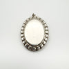 Close-up of the back of chunky oval sterling silver locket