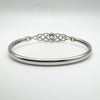 Reverse view showing the polished solid silver band and Celtic back detail