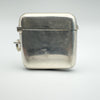 Reverse side of square antique silver vesta case with bail