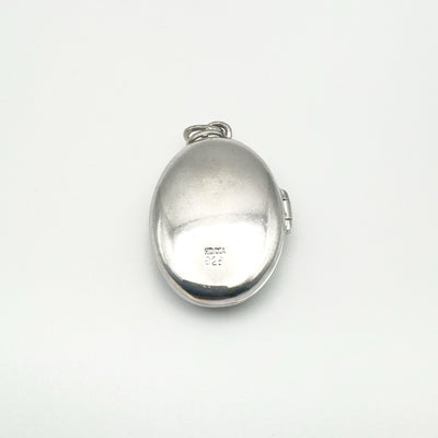 Back view of sterling silver locket stamped 925 and HD