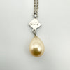 Reverse of pearl pendant showing "SILVER" stamp on sterling silver setting