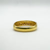 Underside view of gold-plated ruby ring showing smooth solid back