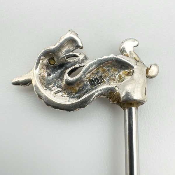 Close-up showing '925' silver hallmark on the underside of the dragon head