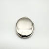 Close-up of plain reverse side of chunky oval sterling silver locket