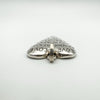 Close-up of oval bail and top of engraved silver love heart pendant