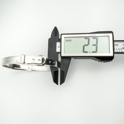 Measuring 2.3mm depth of sterling silver bangle with digital caliper