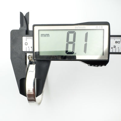 Digital caliper showing 8.1mm height of sterling silver buckle bangle