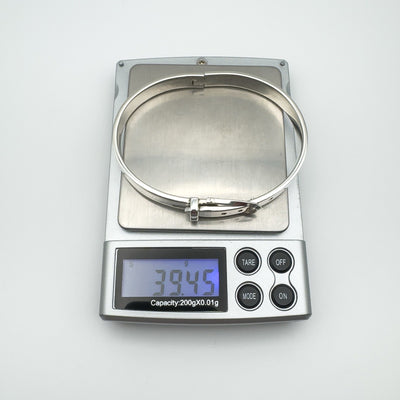 Adjustable sterling silver buckle bangle weighing 39.45 grams