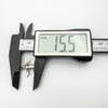 Digital caliper showing width of silver bee charm at 15.5mm