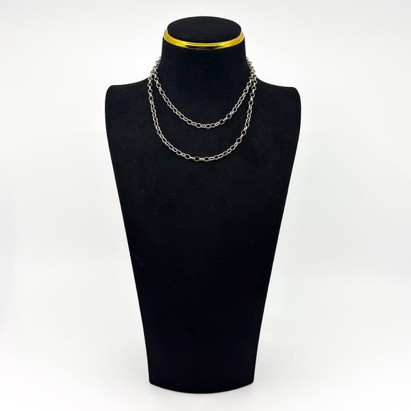 Vintage sterling silver belcher chain necklace shown doubled on a black display bust