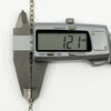 Caliper measurement showing the vintage sterling silver belcher chain link thickness at approximately 1.2mm