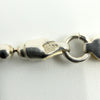 Close-up of CC, 925 and anchor Birmingham hallmark stamps on the clasp fitting.