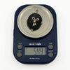 Vintage 14ct white gold black onyx and diamond bow pendant shown on scales weighing approximately 5.49g.