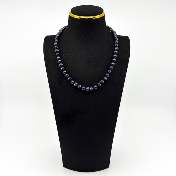 New black freshwater pearl necklace shown on display bust with chunky baroque pearls
