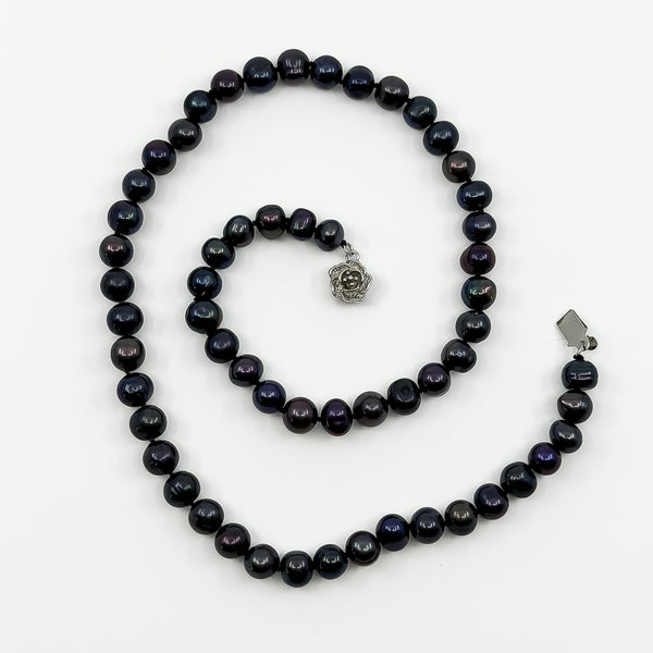 Top view of black freshwater baroque pearl necklace with 49 hand knotted chunky pearls
