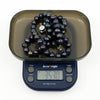 New black freshwater baroque pearl necklace on digital scales weighing approximately 35.3g
