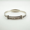 Blank plate detail on preloved silver baby bangle for engraving