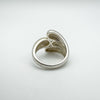 Back view of wrap over sterling silver ring showing inner teardrop motif