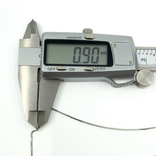 Digital caliper showing sterling silver box chain width at approximately 0.90mm.
