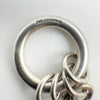 Close-up of 925 and Birmingham hallmarks on sterling silver bracelet