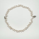Full view of double strand baroque pearl bracelet in silver