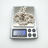 Pearl bracelet weighing 22.03g shown on digital scale