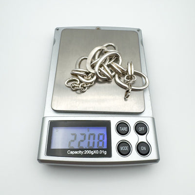 Sterling silver oval link bracelet shown weighing 22.08 grams