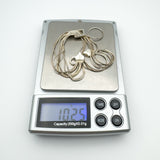 Multi strand sterling silver bracelet weighing 10.25g on digital scale