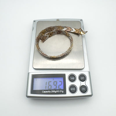 Tricolour bracelet shown weighing 16.92 grams on digital scale