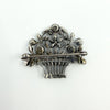 Back of sterling silver giardinetti floral basket brooch showing pin and hook fastening.
