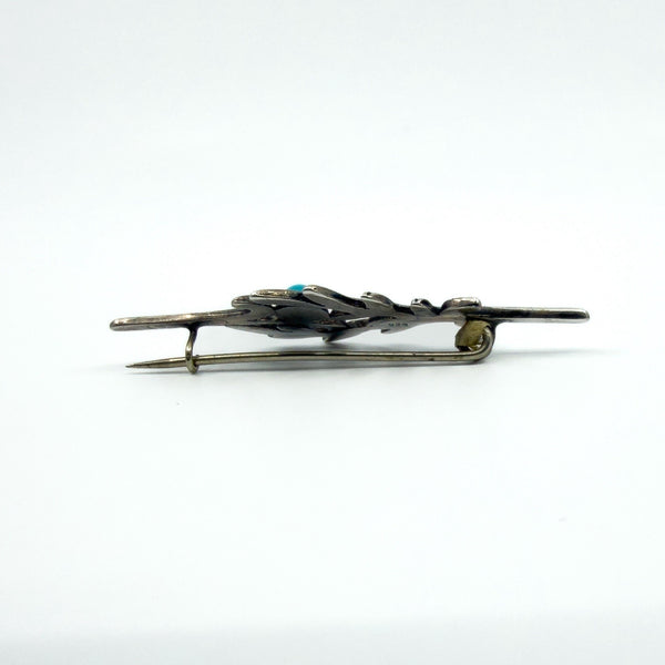 Back angle showing the hinge, pin and C hook clasp on the sterling silver turquoise brooch.