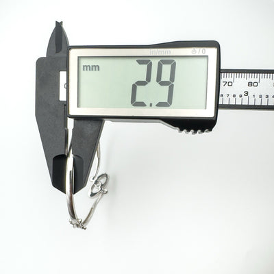 Caliper showing 2.9mm depth of sterling silver CZ bangle