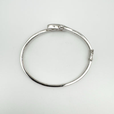 Overhead view of sterling silver bangle with 0.50ct cubic zirconia