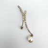 Sterling silver pendant with CZ stones and two pearl drops, front angle