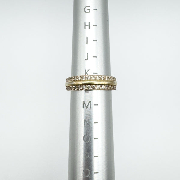 Vermeil cubic zirconia eternity ring shown on ring sizer at UK size K