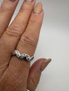 Bezel set marquise cubic zirconia ring styled as a stackable band