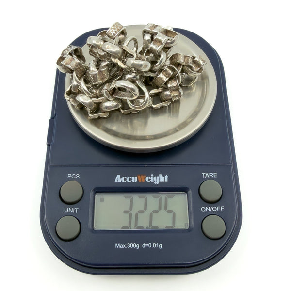 Sterling silver Albert chain on digital scales showing a weight reading of 32.25g.