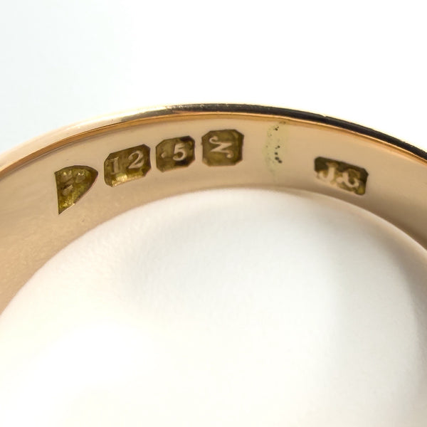 Close-up of Chester 1913 hallmarks inside antique 12ct rose gold ring, stamped 12 and .5, Size J