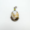 Large chunky sterling silver pendant with oval agate and round green peridot