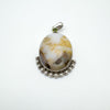 Sterling silver pendant featuring brown and cream agate with green peridot detail