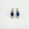 Chunky sterling silver half hoop earrings with rhombus blue CZ stones