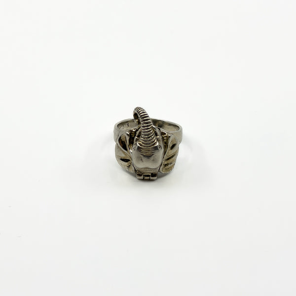 Rear view of chunky sterling silver elephant ring showing the band and elephant head shape